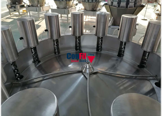 La cabeza 14 conserva en vinagre la balanza de Multihead con el alimentador vertical