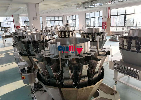 El pesador de Multihead de la balanza de Multihead para el cerdo cocido adobó la máquina de rellenar de la comida con el alimentador de tornillo